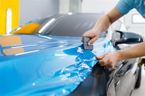 what's cheaper painting or wrapping a car? Considering the potential for customization and personalization in both options.